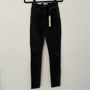 Rollas Black Skinny Jeans With Knee Rip